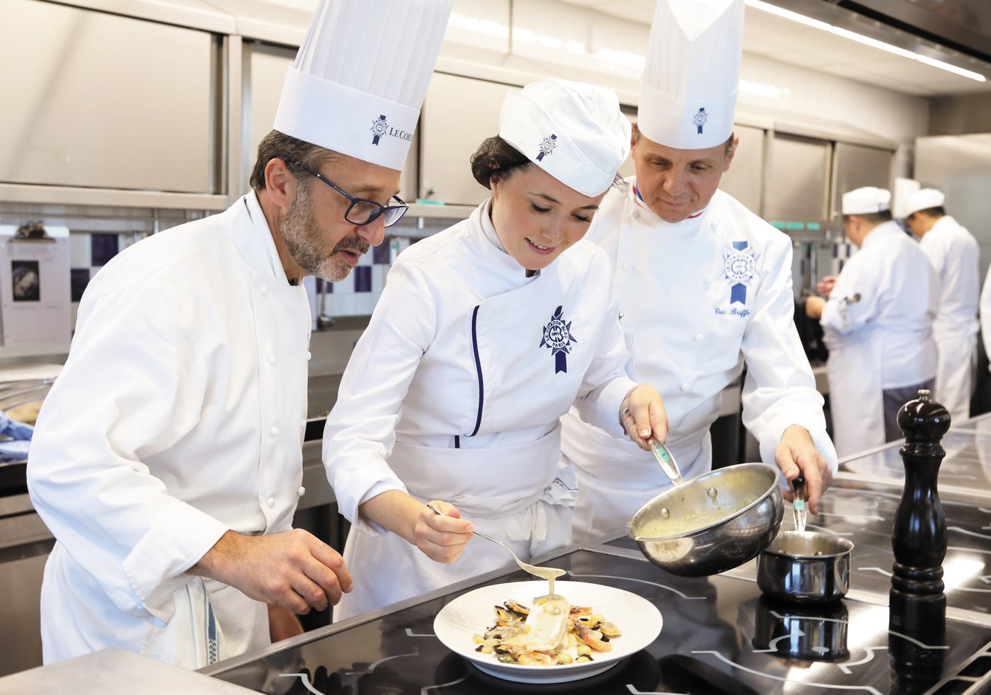 Le-Cordon-Bleu-Paris-Practical-Cuisine-Chef-Caussimon-Chef-Briffard-and-Student.jpg