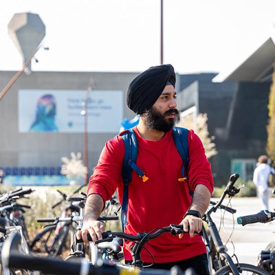 Saheb with bike 700x700.jpg