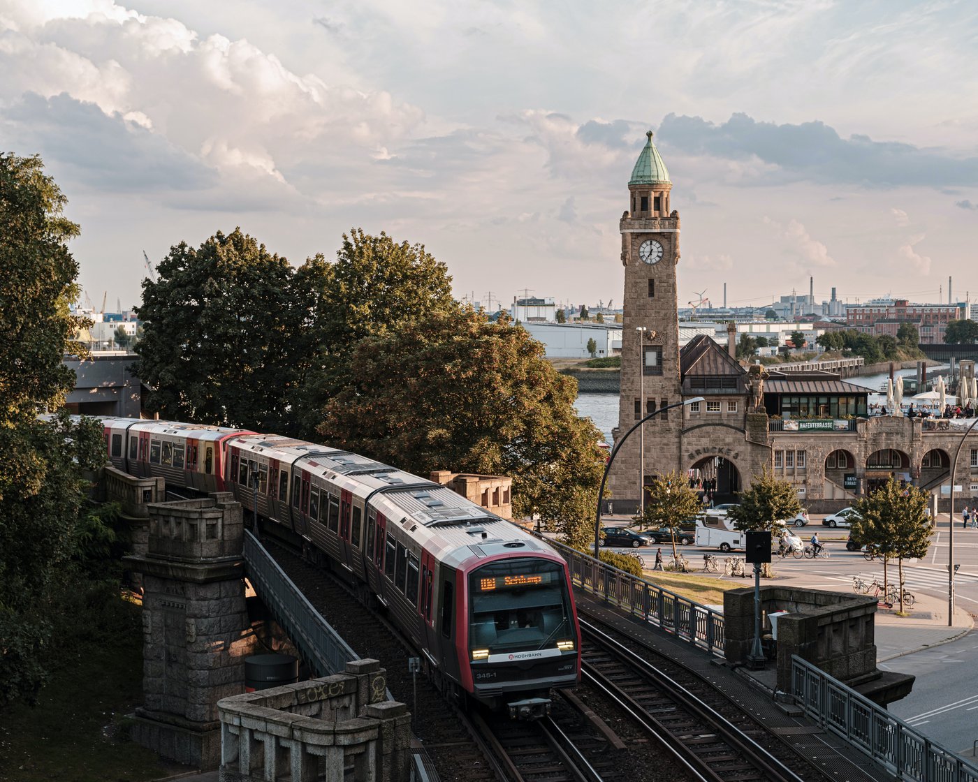 Landungsbruecke clock tower and the hochbahn train in Hamburg